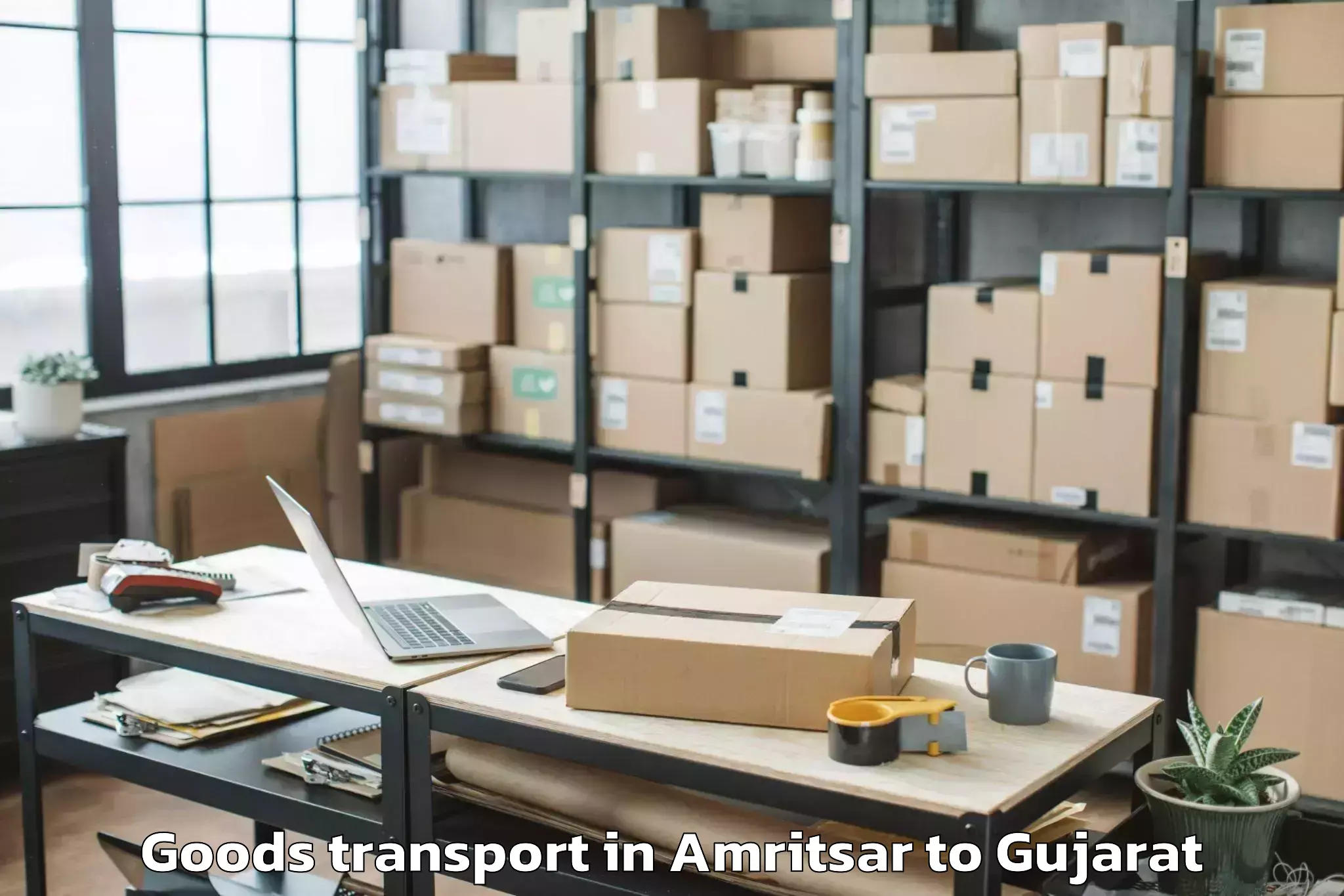 Get Amritsar to Sarangpur Goods Transport